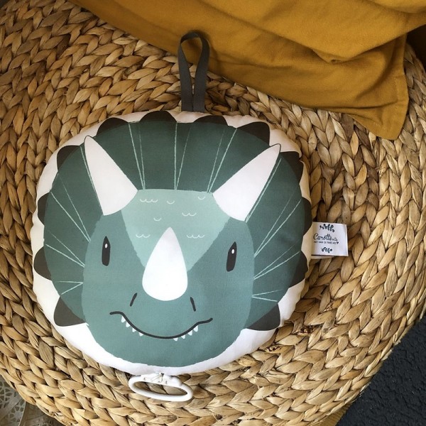 Coussin musical dinosaure