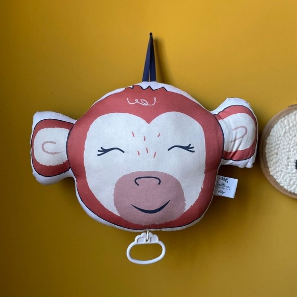 Coussin musical singe
